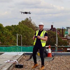 41d1b34fe02fd992f7a5a05aba694134.roof survey with a drone